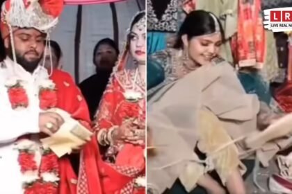 शादी समारोह में दुल्हन की बहन लहंगे में छिपाए जीजा के जूते निकालते हुए, आसपास खड़े लोग हंसते नजर आ रहे हैं।